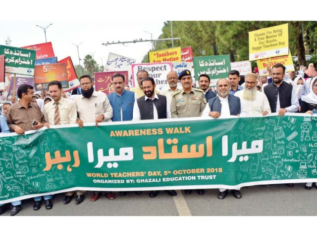 participants march in a world teachers day rally photo express participants march in a world teachers day rally photo express