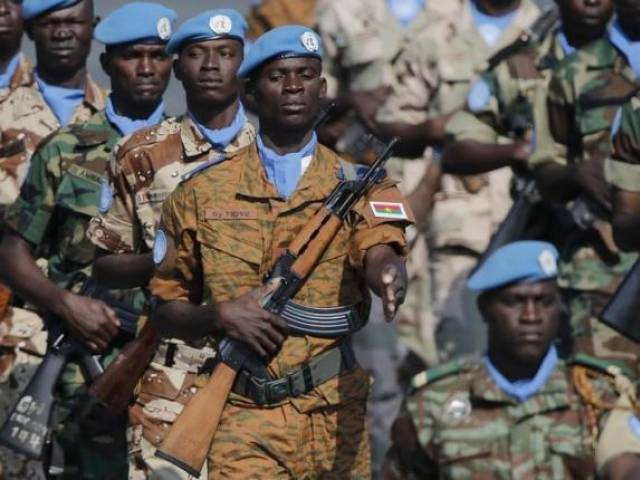 soldiers from the un peacekeeping mission in mali minusma take part in the traditional bastille day military parade in paris july 14 2013 photo reuters