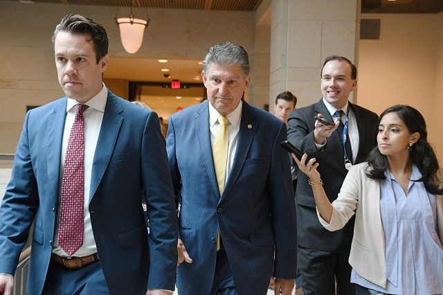 sen joe manchin d wv heads to the senate security office to peruse the fbi report on sexual assault in connection with us supreme court nominee judge brett kavanaugh in washington us october 5 2018 photo reapters sen joe manchin d wv heads to the senate security office to peruse the fbi report on sexual assault in connection with us supreme court nominee judge brett kavanaugh in washington us october 5 2018 photo reapters
