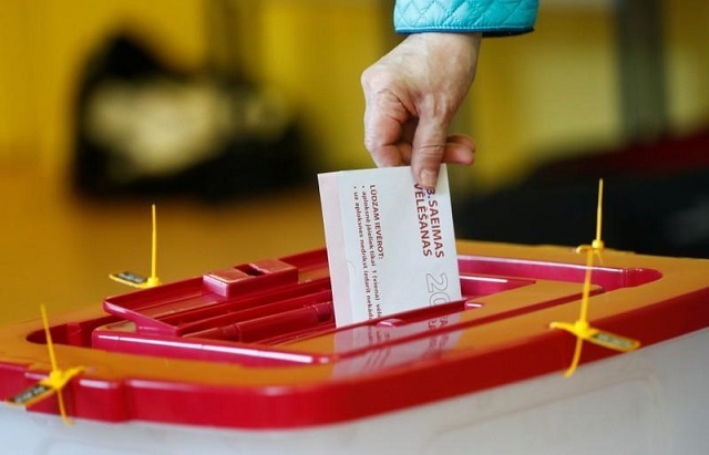 a man casts his vote during a general election in riga latvia photo reuters