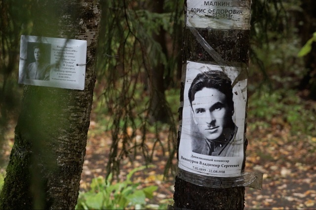 a photo taken on september 28 shows pictures of missing people in the forested area near moscow known as kommunarka where historians belive stalin 039 s nkvd secret police killed and buried more than 6000 people in 1937 41 photo afp