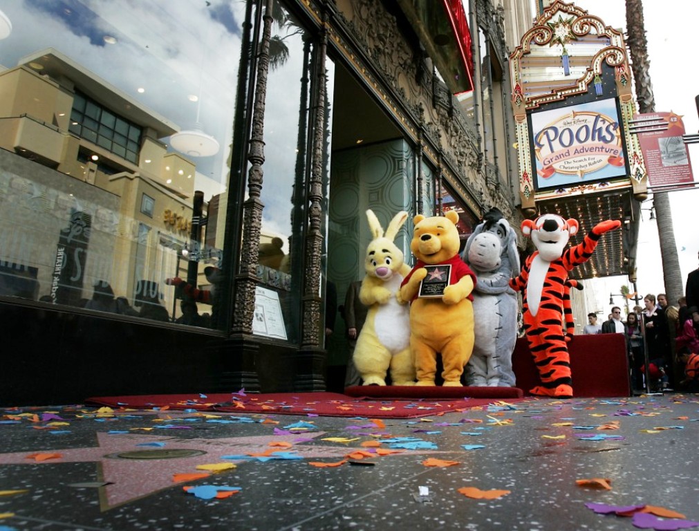 winnie the pooh brings laughter to indonesian quake kids