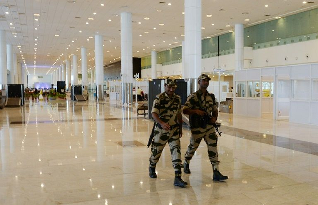 indian airport guards instructed to smile less photo afp indian airport guards instructed to smile less photo afp