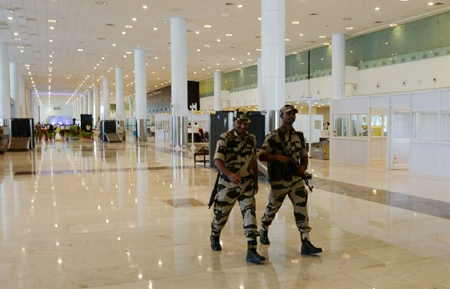 indian airport guards instructed to smile less photo afp