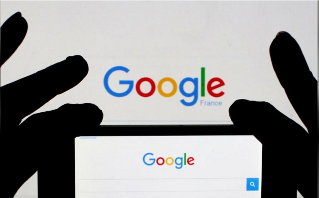 a woman holds her smart phone which displays the google home page in this picture illustration taken february 24 2016 photo reuters