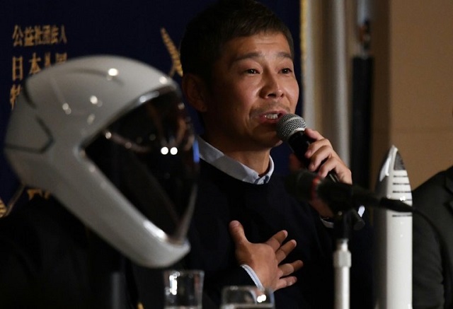 yasaku maezawa paid an undisclosed sum for a ticket on fellow tycoon elon musk 039 s spacex rocket around the moon as early as 2023 photo reuters