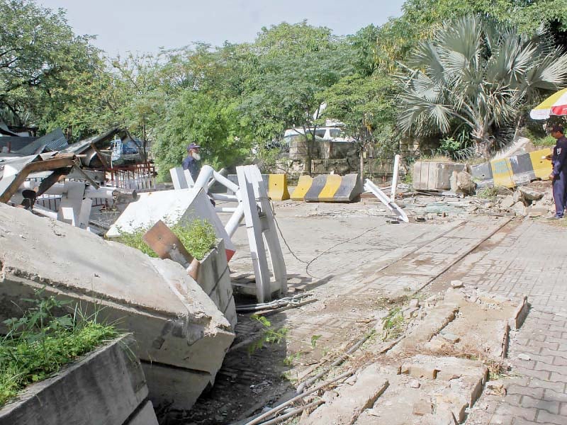 barriers are seen demolished after an anti encroachment operation of cda in sector f 8 markaz photo express