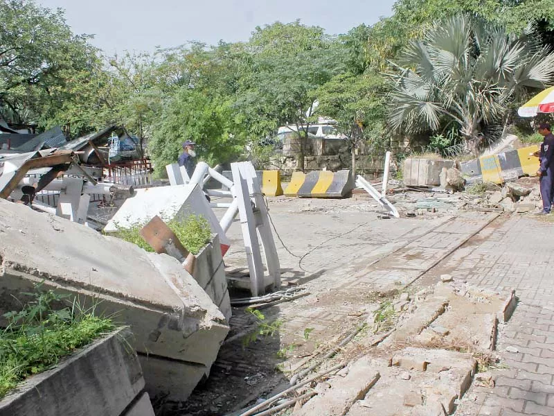 barriers are seen demolished after an anti encroachment operation of cda in sector f 8 markaz photo express barriers are seen demolished after an anti encroachment operation of cda in sector f 8 markaz photo express