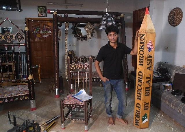 pakistani artist bilal asif works on his pencils artwork at his studio in karachi with a sharp eye for detail bilal asif carefully files down pencils in his studio as part of a quest to set a world record for creating the largest swing made from pencil parts photo afp pakistani artist bilal asif works on his pencils artwork at his studio in karachi with a sharp eye for detail bilal asif carefully files down pencils in his studio as part of a quest to set a world record for creating the largest swing made from pencil parts photo afp