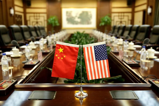 flags of us and china are placed for a meeting at the ministry of agriculture in beijing china june 30 2017 photo reuters