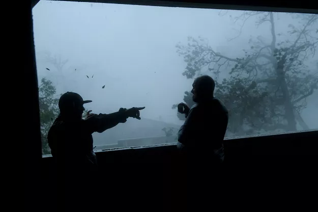 people watch as hurricane michael makes landfall photo afp people watch as hurricane michael makes landfall photo afp