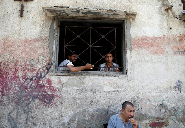 palestinians look out of their home at al shati refugee camp in gaza city september 3 2018 photo reuters