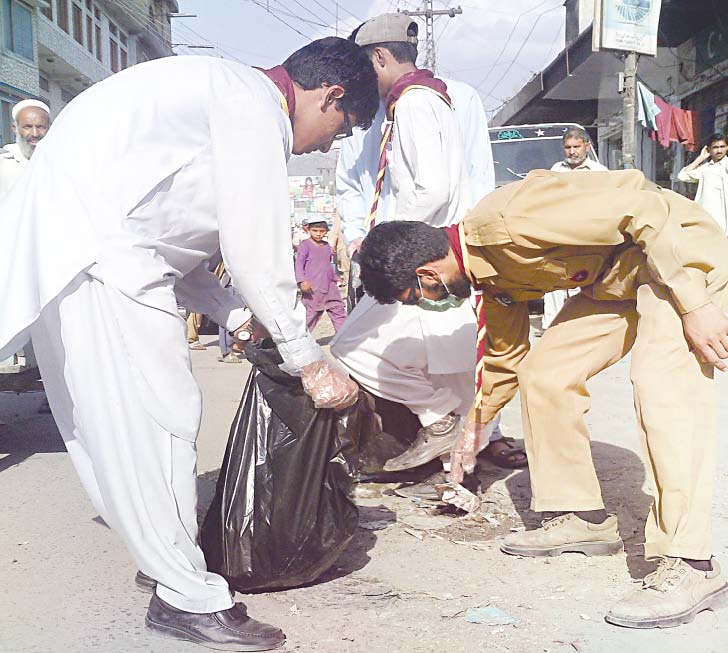 scouts picking up litter from the city streets hyderabad kicks off its own cleanliness drive on wednesday photo fazal khaliq