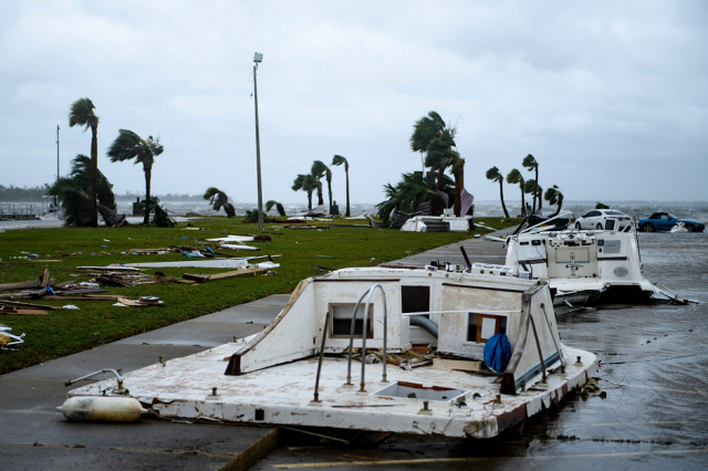 damaged boats and cars are seen in a marina after hurricane michael afp damaged boats and cars are seen in a marina after hurricane michael afp