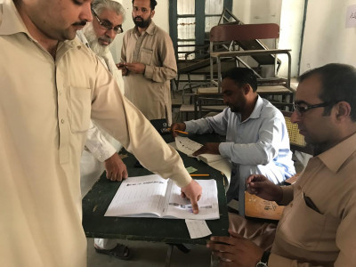 by elections largely peaceful polls held in k p