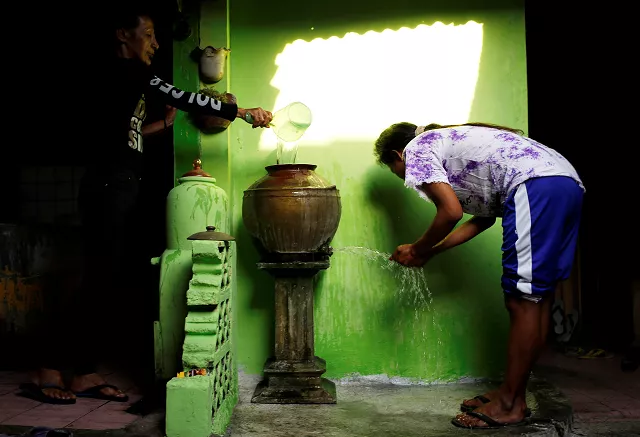 transgender women wash and clean themselves before prayer in yogyakarta indonesia photo reuters transgender women wash and clean themselves before prayer in yogyakarta indonesia photo reuters