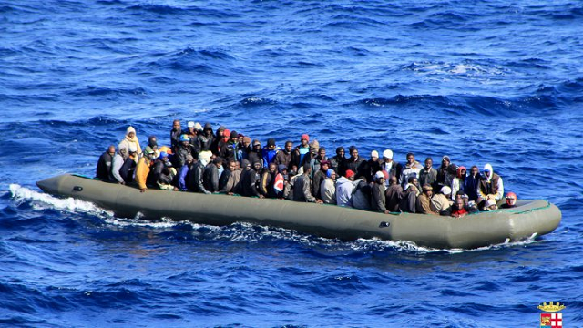 a boat carrying migrants photo afp a boat carrying migrants photo afp