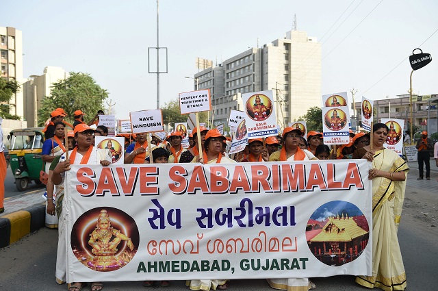 in this file photo taken on october 14 2018 indian ayaappa devotees participate in a peaceful protest rally against the supreme court decision to allow women of all ages to enter inside the kerala 039 s sabarimala temple in ahmedabad   hundreds of extra police in southern india were on high alert october 17 2018 for the scheduled opening to women of all ages of one of the country 039 s most sacred hindu temples thousands of people many of them women have marched in recent days against females being allowed to pray in the hilltop temple at sabarimala in the southern state of kerala photo afp