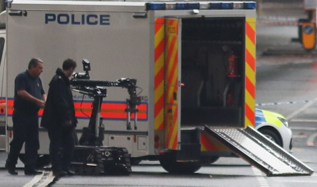 police officers deploy a bomb disposal robot on victoria embankment which leads to parliament after emergency services were alerted to reports of a suspicious package photo afp police officers deploy a bomb disposal robot on victoria embankment which leads to parliament after emergency services were alerted to reports of a suspicious package photo afp