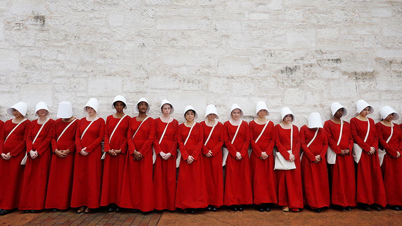 how the handmaid s tale costume became a symbol of women empowerment