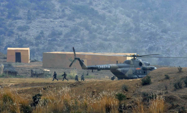 chinese people 039 s liberation army pla soldiers take part in the pakistan china anti terrorist drill as they wrap up their two week military exercise in jhelum on november 24 2011 photo afp chinese people 039 s liberation army pla soldiers take part in the pakistan china anti terrorist drill as they wrap up their two week military exercise in jhelum on november 24 2011 photo afp