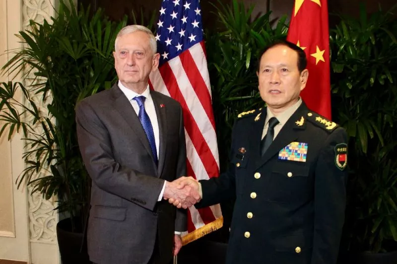 us defence secretary jim mattis shakes hands with his chinese counterpart general wei fenghe during a meeting on the sidelines of the association of southeast asian nations asean security summit in singapore photo afp us defence secretary jim mattis shakes hands with his chinese counterpart general wei fenghe during a meeting on the sidelines of the association of southeast asian nations asean security summit in singapore photo afp