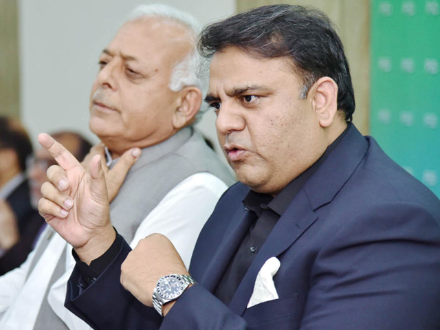 information minister fawad chaudhry flanked by petroleum minister ghulam sarwar khan addresses a news conference in islamabad on thursday photo inp