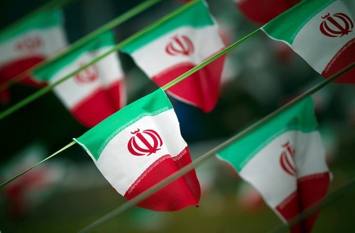 iran 039 s national flags are seen on a square in tehran photo reuters