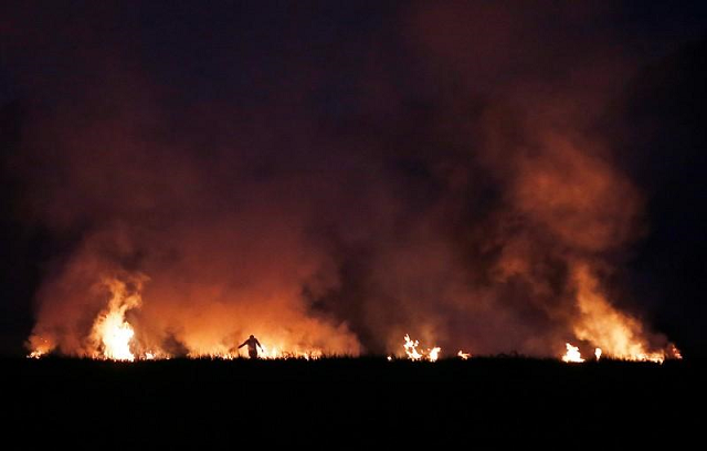 indian farmers set fire to crop residue photo afp indian farmers set fire to crop residue photo afp