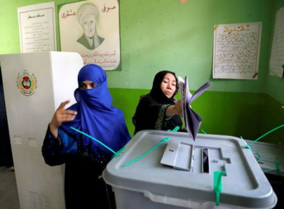 afghans shut out by polling station chaos return to vote