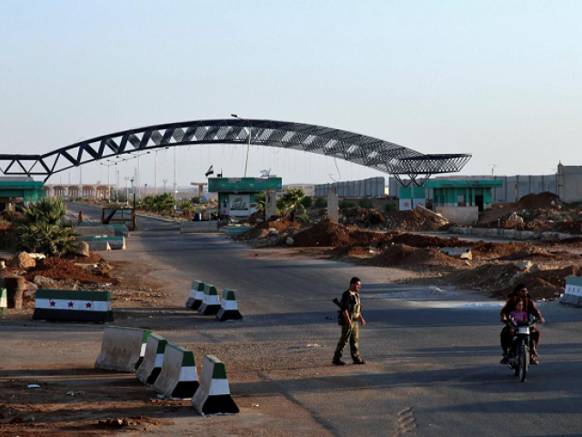 by reopening the key nassib border crossing with jordan this month the syrian regime is inching towards a return to trade with the wider region the nassib border crossing is depicted here photo reuters