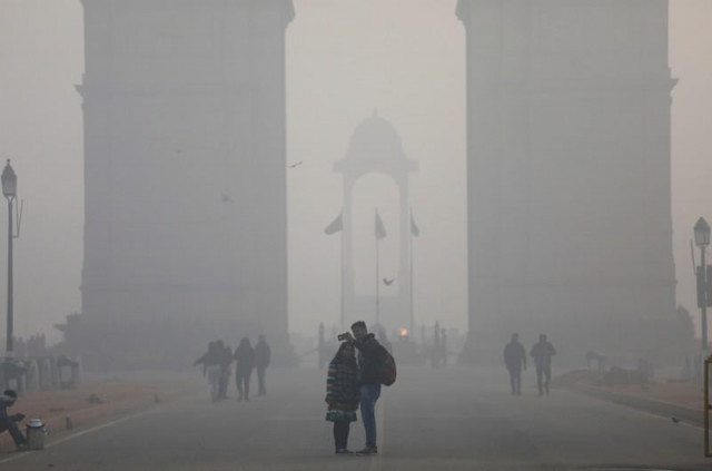 people take a selfie in front of the india gate war memorial on a smoggy winter morning in new delhi india december 26 2017 photo reuters people take a selfie in front of the india gate war memorial on a smoggy winter morning in new delhi india december 26 2017 photo reuters