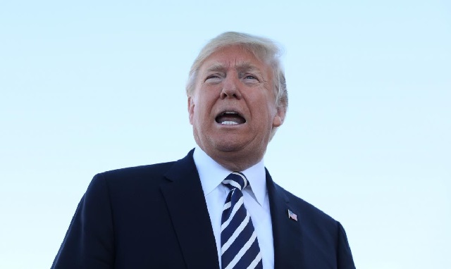 us president donald trump speaks with reporters before departure from elko regional airport in elko nevada us photo reuters