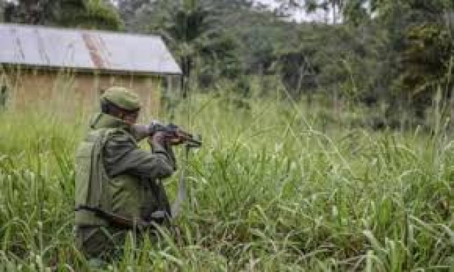 afp file a soldier with the fardc armed forces of the democratic republic of the congo takes cover during exchanges of fire with members of the adf allied democratic forces in opira north kivu photo afp afp file a soldier with the fardc armed forces of the democratic republic of the congo takes cover during exchanges of fire with members of the adf allied democratic forces in opira north kivu photo afp