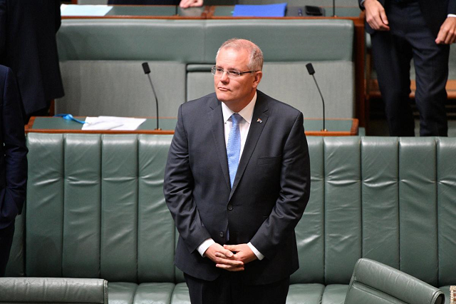 australia 039 s prime minister scott morrison stands before delivering the national apology to survivors of child sexual abuse in the house of representatives at parliament house in canberra australia october 22 2018 photo reuters