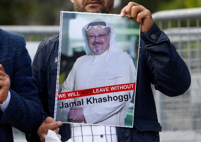 a demonstrator holds picture of saudi journalist jamal khashoggi during a protest in front of saudi arabia 039 s consulate in istanbul turkey photo reuters