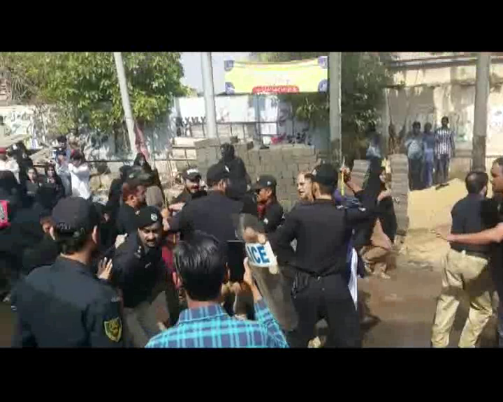 police uses water canons and baton charge protestors photo screengrab