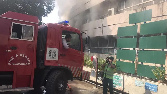 a fire brigade putting out flames at the pid building in islamabad photo zulfiqar baig express a fire brigade putting out flames at the pid building in islamabad photo zulfiqar baig express