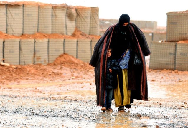 displaced syrians eke out living in border camp photo afp