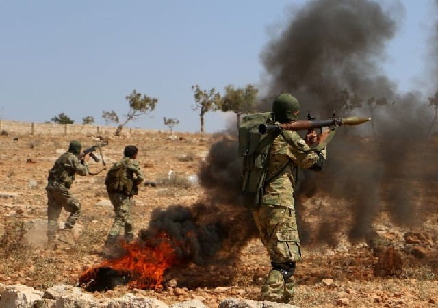 syrian rebel fighters from the national liberation front take part in combat training in idlib province photo afp syrian rebel fighters from the national liberation front take part in combat training in idlib province photo afp