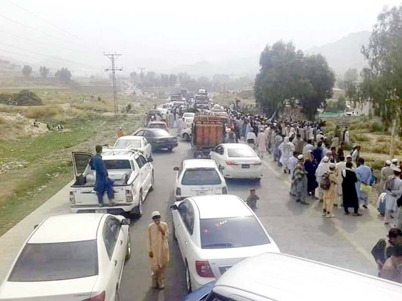tribal people block mohmand bajaur road against police powers photo express