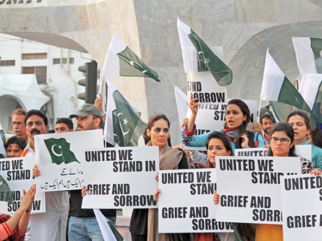 members of civil society gathered at teen talwar on monday to make sure the government does not forget the lives lost in the peshawar school attack photo aysha saleem express photo courtesy never forget pakistan