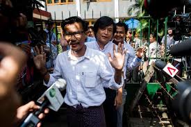 detained myanmar journalists kyaw zaw lin left followed by nayi min center and phyo wai win leave the court compound after a hearing in yangon on friday october 26 photo afp