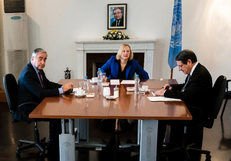 cypriot president nicos anastasiades r and turkish cypriot leader mustafa akinci have agreed to open the first new crossing points in eight years across the island 039 s divide at their first formal meeting since a peace conference collapsed last year photo afp