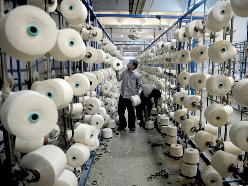 the all pakistan textile mills association aptma the powerful body that represents textile spinners had long argued in favour of import of synthetic fibres photo file