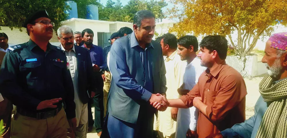 minister for home and tribal affairs saleem khosa shakes hands with an inmate photo express minister for home and tribal affairs saleem khosa shakes hands with an inmate photo express