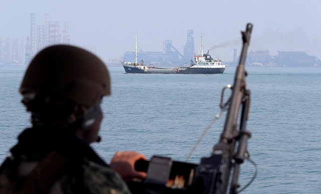 a us navy soldier onboard mark vi patrol boat stands guard as an oil tanker makes its way towards bahrain port during an exercise of us uk mine countermeasures mcmex taking place in arabian sea bahrain september 11 2018 photo reuters a us navy soldier onboard mark vi patrol boat stands guard as an oil tanker makes its way towards bahrain port during an exercise of us uk mine countermeasures mcmex taking place in arabian sea bahrain september 11 2018 photo reuters