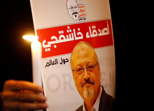 a demonstrator holds a poster with a picture of saudi journalist jamal khashoggi outside the saudi arabia consulate in istanbul turkey october 25 2018 photo reuters