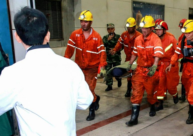 picture taken on october 21 shows rescuers transferring an injured miner after a mining accident in yuncheng county in china 039 s eastern shandong provinc photo afp picture taken on october 21 shows rescuers transferring an injured miner after a mining accident in yuncheng county in china 039 s eastern shandong provinc photo afp
