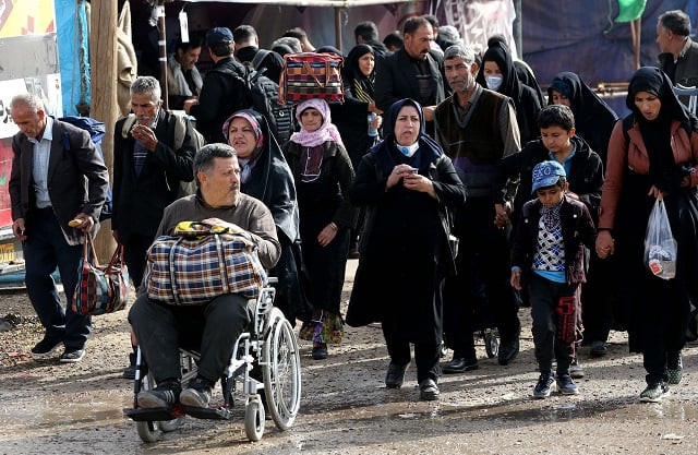 iranian shiite muslims pilgrims walk at the mehran border point between iran and iraq as they head toward the central iraqi shrine city of karbala on october 28 2018 ahead of the arbaeen religious festival arbaeen which marks the 40th day after ashura commemorates the seventh century killing of prophet mohammed 039 s grandson imam hussein photo afp iranian shiite muslims pilgrims walk at the mehran border point between iran and iraq as they head toward the central iraqi shrine city of karbala on october 28 2018 ahead of the arbaeen religious festival arbaeen which marks the 40th day after ashura commemorates the seventh century killing of prophet mohammed 039 s grandson imam hussein photo afp